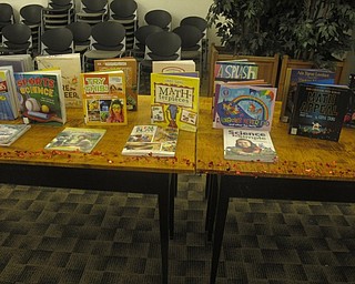 Neighbors | Zack Shively.The families that attended the "I love STEAM" program could check out books relating to science, technology, engineering, arts or mathematics at the library.