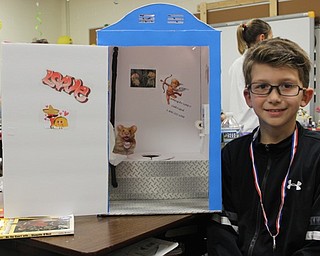 Neighbors | Abby Slanker.A Hilltop Elementary School fourth-grader built a Cupid’s Porta-Potty, Inc. Valentine’s Day box to collect valentines from his classmates on Feb. 14.