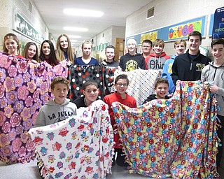 Neighbors | Zack Shively.Holy Family School students made blankets to donate to the Beatitude House during Catholic Schools Week. Pictured are, from left, (front) Camden Forsyth, Silas Blackshear, Tyler Hayes, Mitchell Tofil; (back) Marisa Davanzo, Angelina Rotunno, Alexa Frecko, Aliana Seavina, Jenna Hughes, Paige Ogden, Grace Raymer, David Vuksanovich, Zachary Hryb, Clenn Christopher, Jack Desmond and Jack Pepperney.