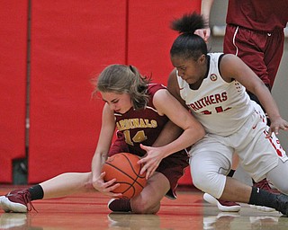 Keasia Chism (34) of Struthers and Mooney's Camden Hergenrother (14) dive for a loose ball during Thursday nights tournament game at the Struthers field house.  Dustin Livesay  |  The Vindicator  2/22/18 Struthers.