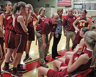Cardinal Mooney head coach Jason Baker (middle) encourages his team late in the fourth quarter during Thursday nights tournament game against Struthers at the Struthers field house.  Dustin Livesay  |  The Vindicator  2/22/18 Struthers.