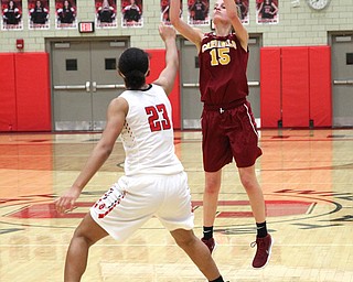 Mooney's Lauren Frommelt (15) puts up a 3-pointer over Trinity McDowell (23) of Struthers during Thursday nights tournament game at the Struthers field house.  Dustin Livesay  |  The Vindicator  2/22/18 Struthers.