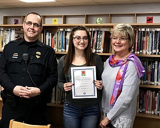 The Boardman Optimist Club recently gave awards to the winners of its annual essay contest during a presentation in the library at Boardman High School. Sgt. Chuck Hillman, club president, and Nancy Hildebrand presented certificates and Barnes & Noble gift cards to three BHS juniors, Mia Lewis, first place; Christina LaRocca, second place, and Isabella Nordquist, third place. Lewis’ essay will advance to the Ohio District level for a chance to win a $2,500 scholarship. The topic of this year’s contest is “Can Society Function Without Respect?” Above, from left, are Hillman, Lewis and Hildebrand.
