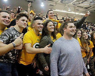 William D. Lewis The Vindicator   Corey Linsley greets students during 2-23-18 basketball game