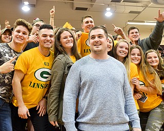 Scott Williams - The Vindicator - 2009 Boardman graduate and Green Bay Packers center Corey Linsley meets Boardman High School students at the Boardman vs Austintown Fitch basketball game on Friday February 23, 2018.