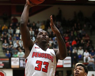 Youngstown State forward Naz Bohannon (33) goes up for two under the basket as Cleveland State forward Anthony Wright (2) watches on during the first half of a NCAA Horizon League college basketball game, Saturday, Feb. 24, 2018, in Youngstown...(Nikos Frazier | The Vindicator)