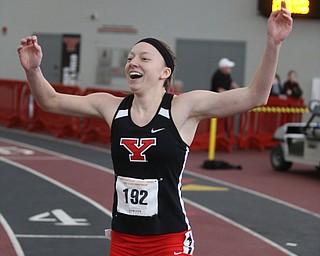 Youngstown's Amber Eles celebrates winning the prelim run of the women's 60 meter hurdles during the first day of the 2018 Horizon League Indoor Championships, Saturday, Feb. 24, 2018, in Youngstown...(Nikos Frazier | The Vindicator)