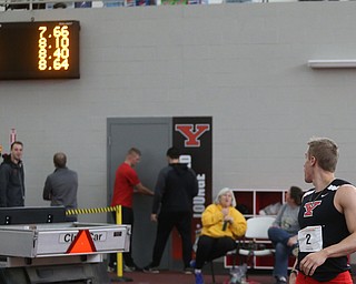 Youngstown's Chad Zallow looks up at the video board after running the prelim Men's 60 meter hurdles during the first day of the 2018 Horizon League Indoor Championships, Saturday, Feb. 24, 2018, in Youngstown...(Nikos Frazier | The Vindicator)
