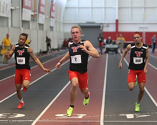 Youngstown's Chad Zallow(center), Josh Beaumant(right) and Lasander Washington run the prelim Men's 60 meter dash during the first day of the 2018 Horizon League Indoor Championships, Saturday, Feb. 24, 2018, in Youngstown...(Nikos Frazier | The Vindicator)
