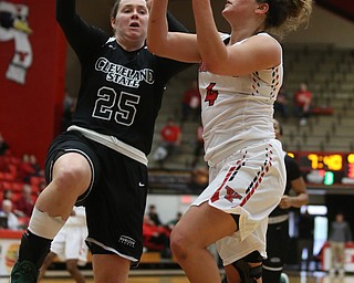 Youngstown State guard Nikki Arbanas (4) goes up for a layup past Cleveland State forward Olivia Voskuhl (25) during the second half of a NCAA Horizon League college basketball game, Saturday, Feb. 24, 2018, in Youngstown...(Nikos Frazier | The Vindicator)