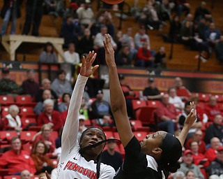 Youngstown State guard Indiya Benjamin (3) goes up for a layup over Cleveland State forward Shadae Bosley (34) during the second half of a NCAA Horizon League college basketball game, Saturday, Feb. 24, 2018, in Youngstown...(Nikos Frazier | The Vindicator)