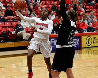 Youngstown State guard Indiya Benjamin (3) goes up for a layup past Cleveland State forward Olivia Voskuhl (25) during the second half of a NCAA Horizon League college basketball game, Saturday, Feb. 24, 2018, in Youngstown...(Nikos Frazier | The Vindicator)