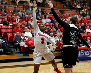 Youngstown State guard Indiya Benjamin (3) goes up for a layup past Cleveland State forward Olivia Voskuhl (25) during the second half of a NCAA Horizon League college basketball game, Saturday, Feb. 24, 2018, in Youngstown...(Nikos Frazier | The Vindicator)