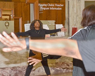 Zumba instructor Kelley Frazier from Mercy Health gets attendees of the Delta Sigma Theta Sorority Health Symposium moving at the Youngstown Metropolitan Housing Authority's Amedia Plaza on Saturday February 24, 2018. 

Scott Williams - The Vindicator