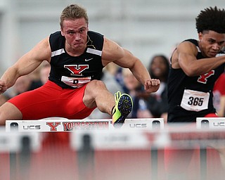 YOUNGSTOWN, OHIO - FEBRUARY 24, 2018: 2018 Horizon League Indoor Track & Field Championships-  YSU Penguins' Char Zallow (387) runs 7.65 secs to qualify with the best time for the mens' 60m hurdle final at Watson and Tressel Training Site, YSU, Youngstown, OH.  MICHAEL G. TAYLOR | THE VINDICATOR