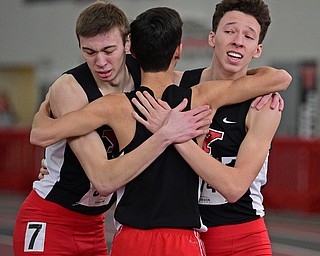 YOUNGSTOWN, OHIO - FEBRUARY 25, 2018: Youngstown State's Sean Peterson gets a hug from XXX and Dylan Dombi after winning the 800 meter during the Horizon League Indoor track Championship meet. DAVID DERMER | THE VINDICATOR