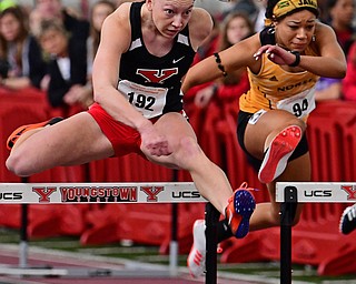 YOUNGSTOWN, OHIO - FEBRUARY 25, 2018: Youngstown State's Amber Eles clears a hurdle during the women's 60 meter hurdles during the Horizon League Indoor track Championship meet. DAVID DERMER | THE VINDICATOR