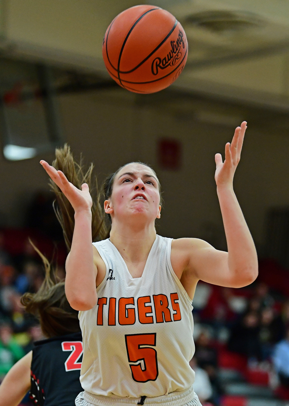 AUSTINTOWN, OHIO - FEBRUARY 26, 2018: Howland's Kamryn Buckley looks the ball into her hands for the easy rebound during the first half of their OHSAA district tournament game at Fitch High School. Howland won 35-24. DAVID DERMER | THE VINDICATOR