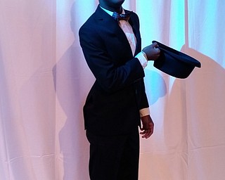 Neighbors | Zack Shively.Highway Tabernacle participated in the international Night to Shine on Feb. 9. The event gave people with special needs a prom experience. Pictured, Quin Chamberlain posed for a photo on the stage of Highway Tabernacle.