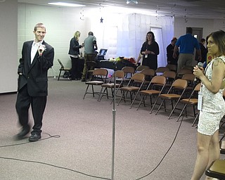 Neighbors | Zack Shively.The Night to Shine provided attendees with fun and games in a meeting room. Highway Tabernacle set up games, a photo booth and karaoke. The karaoke had televisions and a DJ to play songs, such as Carly Rae Jepsen's "Call Me Maybe."