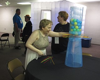 Neighbors | Zack Shively.Highway Tabernacle had large versions of games such as Connect 4, Jenga, Kerplunk, Tic-Tac-Toe, and checkers for the Night to Shine activities.