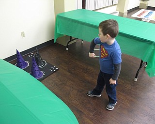 Neighbors | Zack Shively.The Boardman library's Wizard of Oz program on Feb. 8 had a couple games for children, including Twister and a ring toss game.