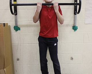 Neighbors | Abby Slanker.A Hilltop Elementary School fourth-grade student successfully completed several chin ups during the American Heart Association’s Jump Rope for Heart.