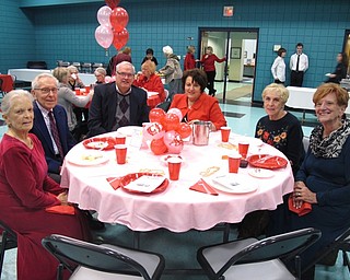 Neighbors | Zack Shively.The Ursuline Center had 125 people register for their Valentine's Day Dinner. The night had red and pink decorations from Party On in Austintown.