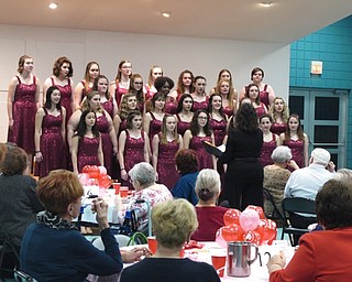 Neighbors | Zack Shively.The Boardman Singers and Chorale performed at the Valentine's Day Dinner after everyone had eaten. Linda Smrek directed both choirs.