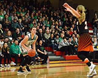 Scott Williams - The Vindicator - West Branch's Peyton Alazaus (#33) lines up a shot as Howland's Alex Ochman (#20) tries to block at their playoff game at Austintown Fitch on Thursday March 1, 2018.