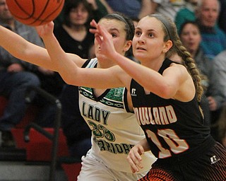 William D. Lewis The Vindicator  West Branch's Peyton Alazaus(33) and Howalnd's Gabby Hartzell(10) go for the ball3-1-18 at Fitch.