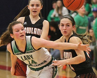 William D. Lewis The Vindicator  West Branch's Hannah rRdgway(24) and Howland's Ashley Chambers(3) and Makenzie Maze (4) go for the ball 3-1-18 at Fitch.