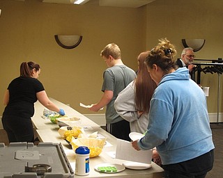 Neighbors | Zack Shively.The Poland library's "Bet You Can't Eat Just One!" program featured a blind taste test as well as a presentation. The taste test included five different types of potato chips. The attendees tasted the chips and ranked them.