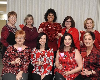 In recognition of Heart Health Month, members of the Austintown Junior Women’s League wore red to the February meeting. Members participated in a presentation and quiz, offering tips and suggestions on healthful eating and promoting a healthy lifestyle. For information, visit austintownjuniorwomensleague.org. Above, seated from left, are Janie Surman, Danielle Chine, Jennifer Bodnar and Genevieve Bodnar. Standing are Janice Simmerman, Linda Jones, Ruty Rodriguez-Patterson, Peggy Bennett and Lynn Larson.