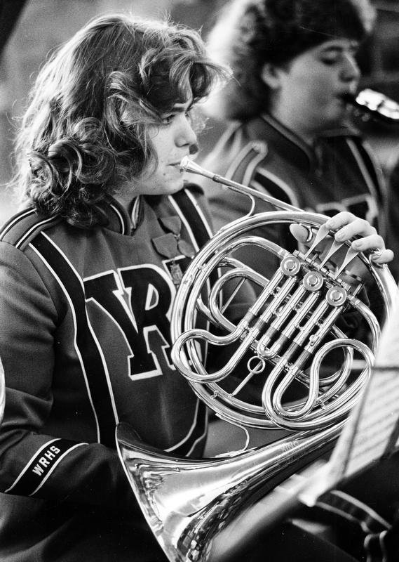 Twenty-three area concert and symphonic bands were in the spotlight Friday evening and Saturday as the Ohio Music Education Association held its 1987 District Band and Chorus Contest at Niles McKinley High School.  The bands competed in four classes, from A to D, depending on size.  Each played three pieces and was judged by a panel of four...Jeni Driver on the French horn exhibited the intense concentration necessary to make her band, Western Reserve Local High School in Berlin Center, sound its best...Photo by Robert K. Yosay, The Vindicator.