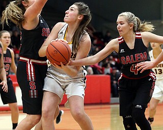 STRUTHERS, OHIO - MARCH 3, 2018: South Range's Dani Vuletich (25) goes for the shot against Salem's Kyla Jamison (42) but is fouled by Salem's Casey Johnson (4) during the 1st qtr at Struthers High School, Struthers' Fieldhouse. MICHAEL G. TAYLOR | THE VINDICATOR