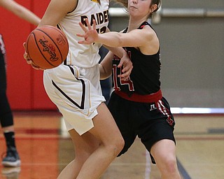 STRUTHERS, OHIO - MARCH 3, 2018: Salem's Paige Bailey (14) defends against South Range's Maddie Durkin (13) during the 4th qtr at Struthers High School, Struthers' Fieldhouse. MICHAEL G. TAYLOR | THE VINDICATOR