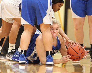 Hailee Carpenter (4) of Lisbon tries to free s loose ball during the first half of Saturday afternoons championship matchup against Valley Christian at Mineral Ridge. Dustin Livesay | The Vindicator 3/3/18 Mineral Ridge.