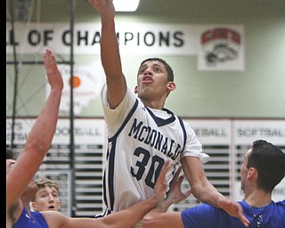 William D Lewis The Vindicator  McDonald's Braedon Poole(30) goes for 2 past Western Reserve'sDom Velasquez(2).