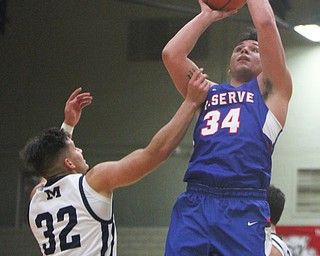 William D. Lewis The Vindicator   Western Reserve's Jack Cappabianca(34) shoots past McDonald'sRyan Scala(22).