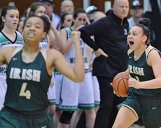 St. Vincent-St. Mary's Kendall Miller (right) storms off the court as time expires in the fourth quarter of the Irish's Division II regional semifinal game against West Branch Tuesday at Barberton High School.  (Jeff Lange/ABJ/Ohio.com correspondent)