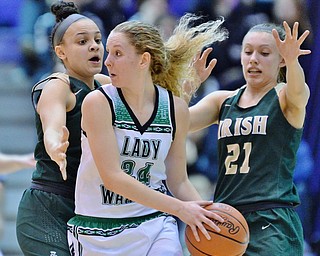 St. Vincent-St. Mary's Kendall Miller (left) and Maria Dobson (right) double-team West Branch's Sarrah Tennefoss during the second quarter of their Division II regional semifinal game Tuesday at Barberton High School. (Jeff Lange/ABJ/Ohio.com correspondent)