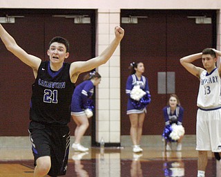 William D. Lewis The Vindicator Lakeview 's Jeff Remick(21) celebrates after defeating Poland 3-7-18  at Boardman. At right is Poland'sBrandon Barringer(13).