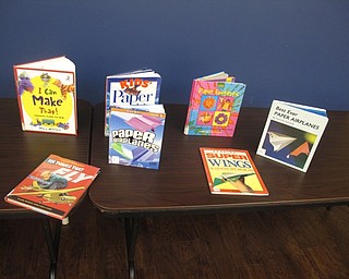 Neighbors | Zack Shively.Librarian Karen Saunders got the idea for the crafts from St. Clair Adams Sullivan's book, "Bats, Butterflies and Bugs: A Book of Action Toys." Though the library no longer holds that book, Saunders set out a number of similar titles for families to check out.