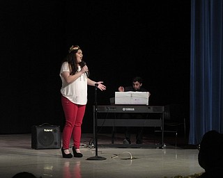 Neighbors | Zack Shively.The concert choir students sang selections from musical theatre and musical films at the Cabaret. Director Bill Klein accompanied the students on piano during the event. Pictured, Sarah Welsh closed the first act of the Cabaret with "You'll Be Back" from "Hamilton."