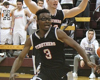 William D. Lewis The Vindicator Struther's Kevin Traylor(3) and Ryan Leonard(20) react after defeating Howland   3-8-18  at Boardman.