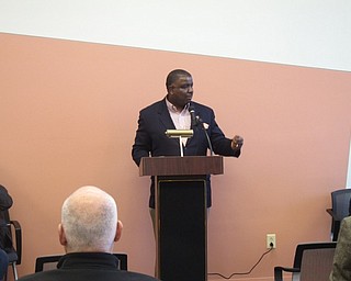 Neighbors | Zack Shively.The dedication began with an invocation by Father William John Loveless of St. Brenden Catholic Church. Several speakers talked after the invocation, including Library Executive Director Aimee Fifarek. Pictured, Jamael "Tito" Brown spoke about his love for the public libraries.