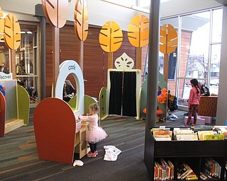 Neighbors | Zack Shively.The new Michael Kusabala library on Mahoning Avenue has a children's area that has been designed around educational and literacy standards, such as areas that work on motor skills and other sections that work on cognitive abilities.