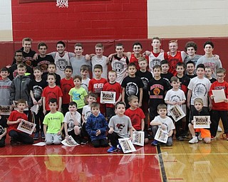 Neighbors | Abby Slanker.Canfield High School varsity basketball players (back) joined the Courtside Cardinals at the Courtside Open House on Feb. 26. The Courtside Cardinals (front) are first-, second- and third-grade students who participated in the first-year program.