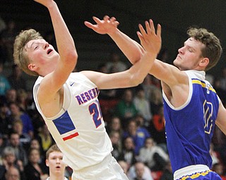 William D. Lewis the Vindicator  WR'sCade Hilles(24) shoots past East Canton's damian Clark)0) at Struthers 3-9-18.